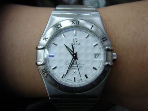 收購OMEGA錶